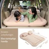 A mother and child are lying on an inflatable mattress inside the back of an SUV. Produktbild-Vorschau