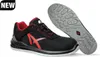 A pair of black and red safety shoes with their sole shown separately. Anteprima dell’immagine prodotto