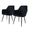 Two black velvet dining chairs with metal legs are shown against a white background. Produktbild-Vorschau