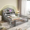 A child's bed with a house-shaped headboard and safety rails, set up in a bedroom with a window and curtains. Náhled obrázku produktu