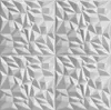 A seamless pattern of white 3D wall panels with a geometric, faceted design. Produktbild-Vorschau