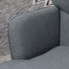 A close-up view of the armrest of a gray fabric chair. Produktbild-Vorschau