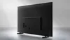 The back of a black Samsung smart TV is shown on a light gray background. Náhled obrázku produktu