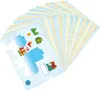 A fan of printed sheets with Christmas-themed designs, including a Santa Claus figure and gift elements, arranged in a fanned-out manner against a white background. Anteprima dell’immagine prodotto