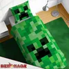 A Minecraft Creeper themed duvet cover and pillow set on a bed. Podgląd zdjęcia produktu