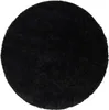 A round black rug on a white background. Voir les images du produit