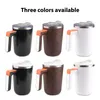 A product image showing three different colors of self-stirring mugs arranged in two rows. Podgląd zdjęcia produktu