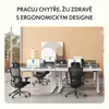 An office space with multiple adjustable desks and ergonomic chairs. Anteprima dell’immagine prodotto