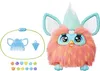 A coral-colored plush toy with teal ears and a teal tuft of hair, along with accessories, is displayed against a white background. Podgląd zdjęcia produktu
