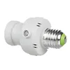A white light bulb socket adapter with a sensor. Anteprima dell’immagine prodotto