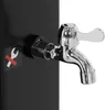 A close-up of a black outdoor shower with a chrome faucet and a warning sticker. Produktbild-Vorschau