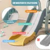 A close-up view of a children's slide with various sections labeled in German. Anteprima dell’immagine prodotto