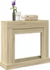 A light brown wooden fireplace surround with decorative items on top. Voir les images du produit