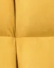 A close-up view of yellow fabric with visible stitching. Náhled obrázku produktu