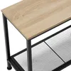 Close-up view of a shelf with a light wood top and black metal frame. Náhled obrázku produktu