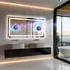 A modern bathroom with a large LED mirror, two sinks, and a bathtub visible through a glass door. Podgląd zdjęcia produktu
