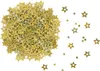 A pile of gold star-shaped confetti on the left and scattered confetti on the right, all on a white background. Produktbild-Vorschau