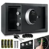 A collage of images showing a safe and its accessories, including batteries, keys, and mounting screws. One inset image shows a finger interacting with the keypad. Produktbild-Vorschau