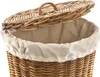 A close-up view of an open wicker laundry basket with a fabric liner. Produktbild-Vorschau