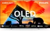A television screen displaying a vibrant image of elephants and trees with prominent text overlays. Produktbild-Vorschau