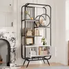 A white and black bookshelf with decorative items on display, placed in a room with a fireplace. Produktbild-Vorschau