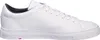 A side view of a white leather sneaker. Voir les images du produit