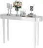 A mirrored console table with decorative items on top, including a floral arrangement, candle holders, and books. Podgląd zdjęcia produktu