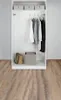 An open wardrobe with clothes hanging on a rail and storage boxes on shelves. Náhľad obrázku produktu