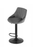 A gray velvet bar stool with a black base and stem, shown against a white background. Produktbild-Vorschau