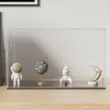 A clear acrylic display case with space-themed figurines on a wooden surface. Náhľad obrázku produktu