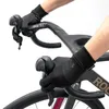 Hands wearing black cycling gloves on a bicycle handlebar. Produktbild-Vorschau