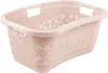 A pink laundry basket with a floral pattern. Produktbild-Vorschau