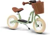 A green Puky balance bike with a brown basket and seat, shown on a white background. Produktbild-Vorschau