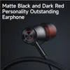 Close-up of a black earphone with a red accent, set against a dark background. Voir les images du produit