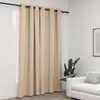 A beige curtain hangs from a black curtain rod in front of a window. Produktbild-Vorschau
