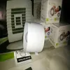 Several boxes of AirRoxy fans are displayed, along with a fan unit and a guarantee card. Náhled obrázku produktu