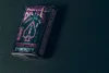 A deck of Bicycle Cyberpunk Cyber City playing cards is shown on a dark surface. Voir les images du produit