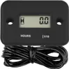 A black digital hour meter with a digital display and a coiled black wire attached. Anteprima dell’immagine prodotto