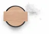 A salt cellar with a wooden lid and a pile of salt next to it on a white background. Produktbild-Vorschau