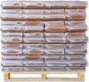 A pallet stacked with many packages of wood briquettes. Produktbild-Vorschau