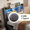 A bed with a headboard featuring shelves, LED lighting, and integrated charging ports. Produktbild-Vorschau
