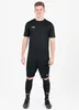 A man wearing a black Jako soccer uniform, standing against a white background. Náhľad obrázku produktu