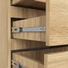 Close-up of wooden drawers with metal drawer slides. Produktbild-Vorschau
