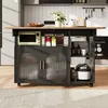 A kitchen island with appliances and food items on display. Produktbild-Vorschau