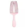 A pink hairbrush with black bristles on a white background. Produktbild-Vorschau