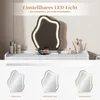 A vanity mirror with LED lighting and makeup accessories on a white dresser. Podgląd zdjęcia produktu