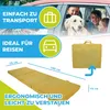 A marketing image showing a folded mattress and its unfolded state, with text highlighting its features and benefits for travel and transport. It also includes a family and dog in a car, suggesting its use for road trips. Produktbild-Vorschau