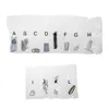 A collection of hardware components, likely for mounting a TV, organized and labeled with letters. Anteprima dell’immagine prodotto