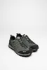 A pair of green hiking shoes on a white background. Produktbild-Vorschau