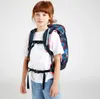 A young girl wearing a backpack. Náhled obrázku produktu
